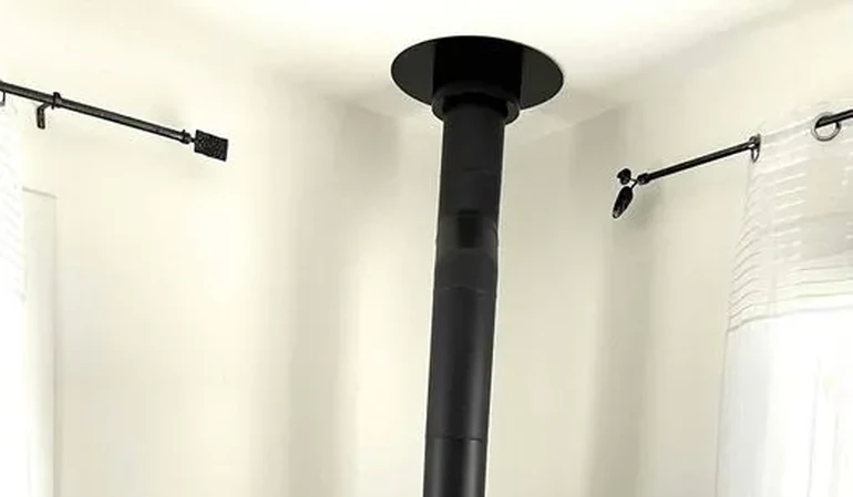 Installation d’un conduit de fumée conforme et bien intégré au logement